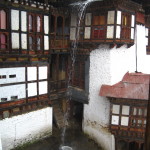 Collecting rain at Chari Monastery for bath water.  
