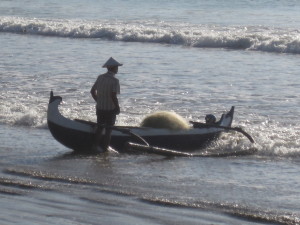 Local fisherman going out to fish at Jimbaran Bay