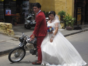 Stumbled onto the wedding photos.  I don't know if a motor scooter would be my choice...but they took a lot of photos.