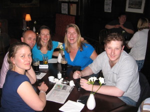 Rachel, Tom and their friends at a British trivia night