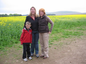 Nic and her older son Ben in the country by her parents with all the rape seed.