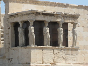 The Caryatids (four statues of women that are holding it )